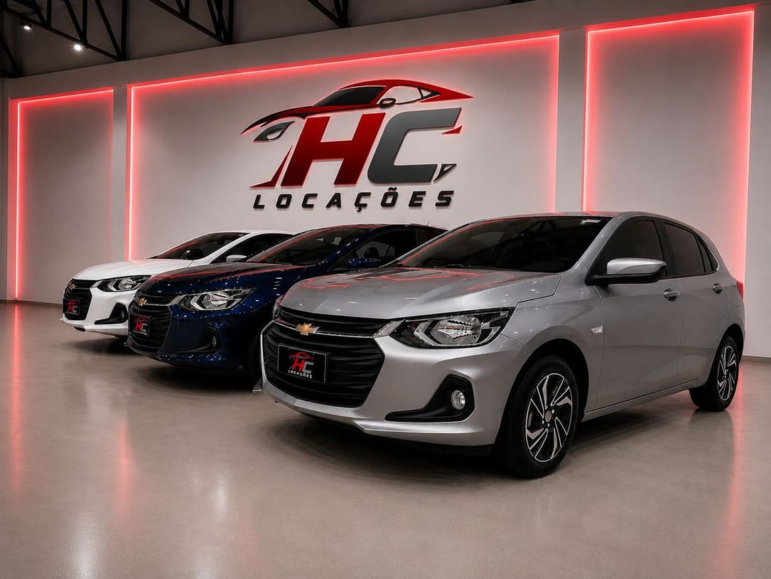 Showroom da HC Locações em Santa Maria com três Chevrolet Onix novos nas cores azul, branco e prata